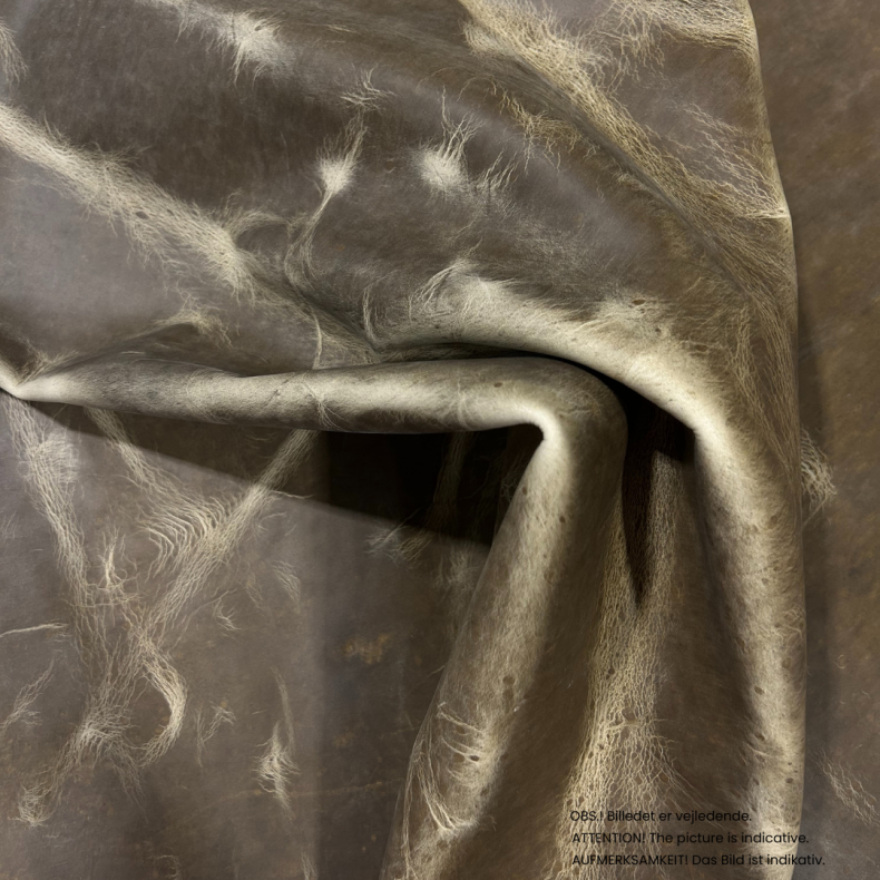 Part of side, waxed with pull up, 1,0-1,5 mm