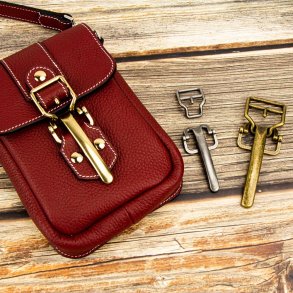 Taschenverschluss 130